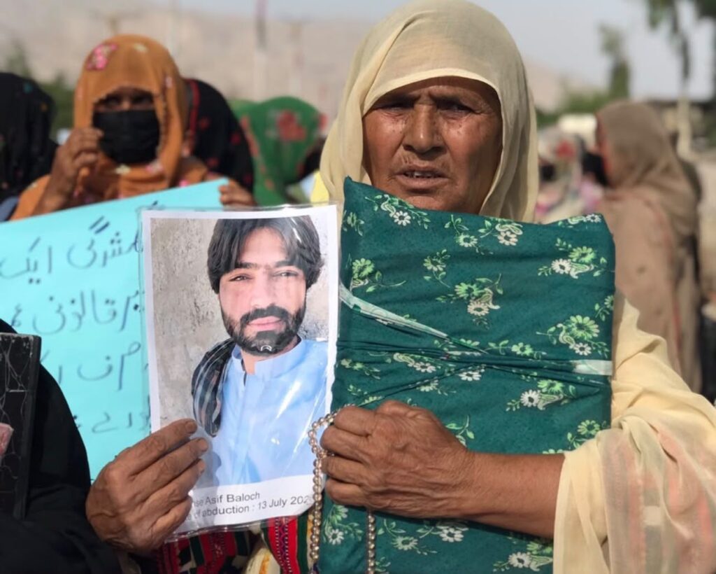 Family Demands Recovery of Disappeared Student Asif Baloch, Mother Holds Quran During Protest